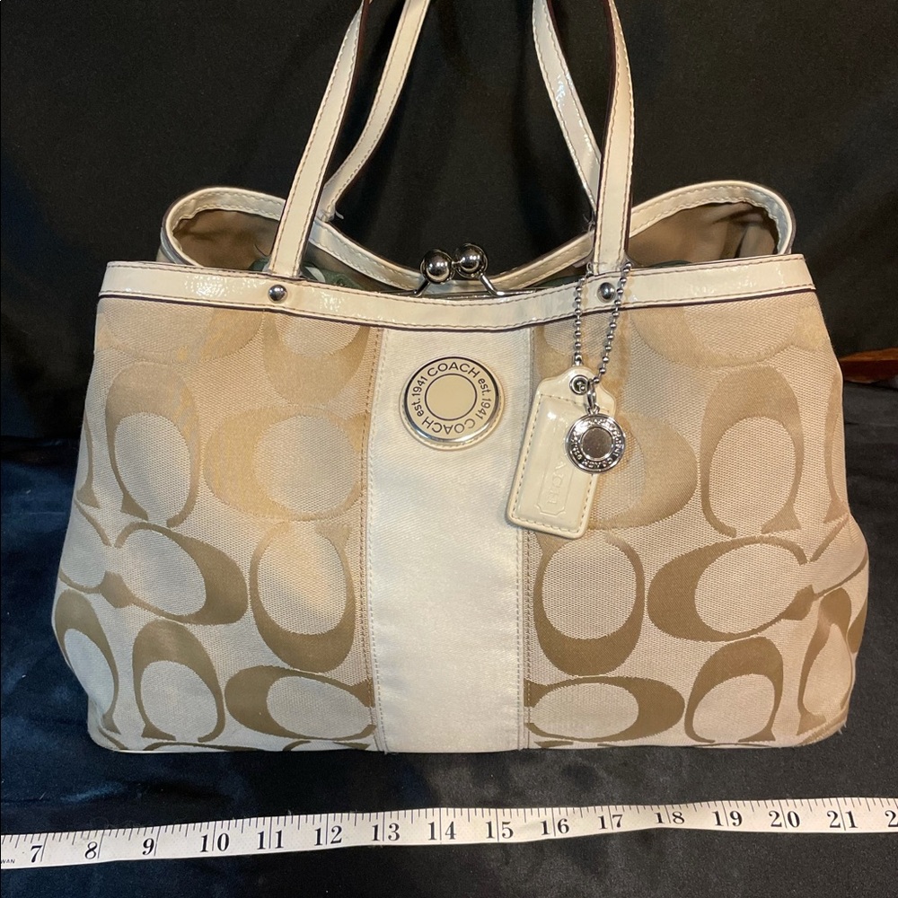 Coach signature strap kiss-locked frame Satchel